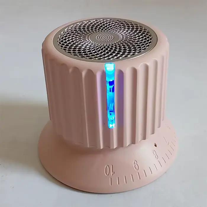 Enceinte sans fil avancée avec base magnétique, compacte et portable, design élégant, idéale pour le